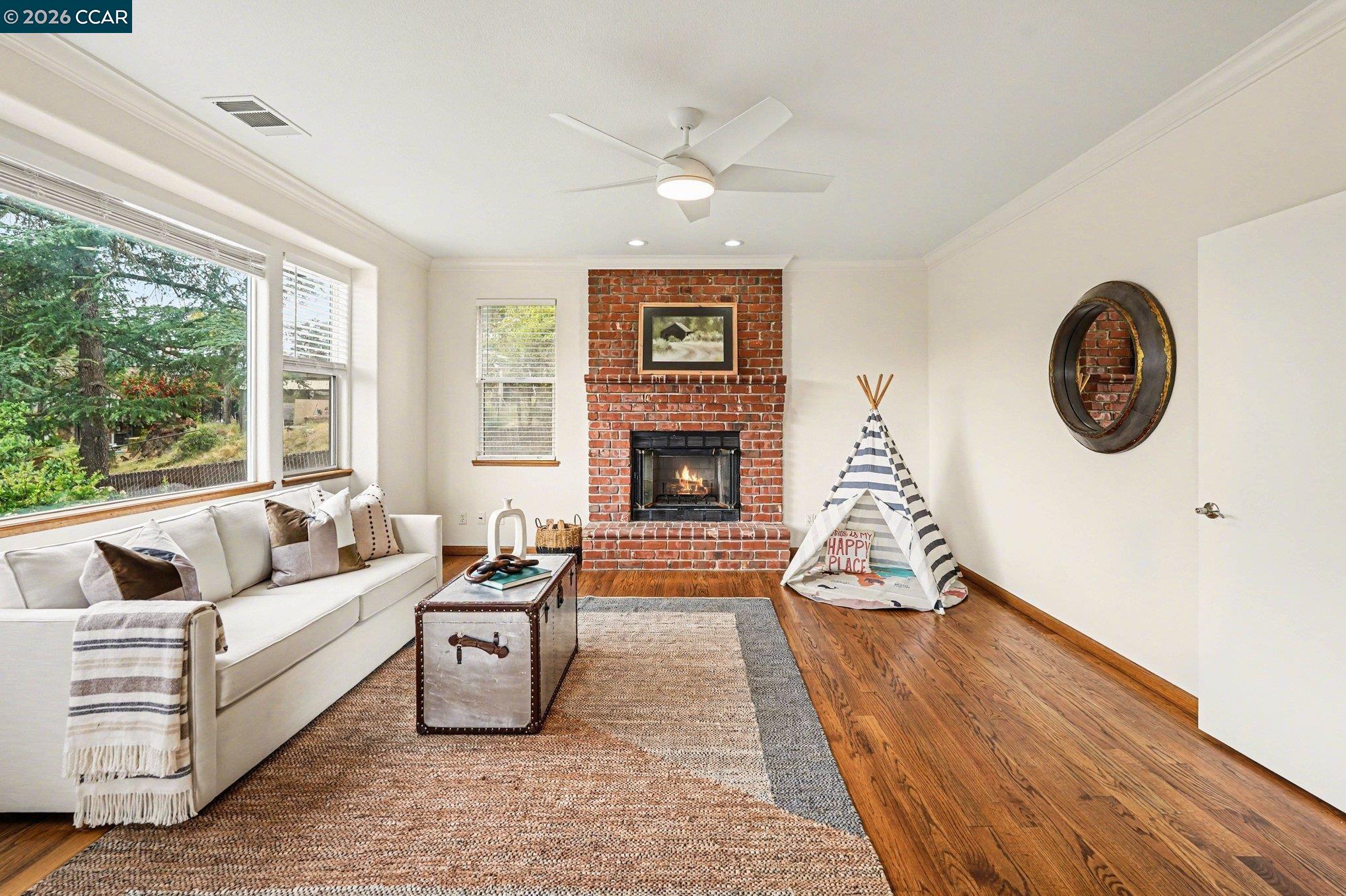 4885 Milden Road Martinez, CA 94553 - Photo 34 of 52 a living room with furniture and a fireplace