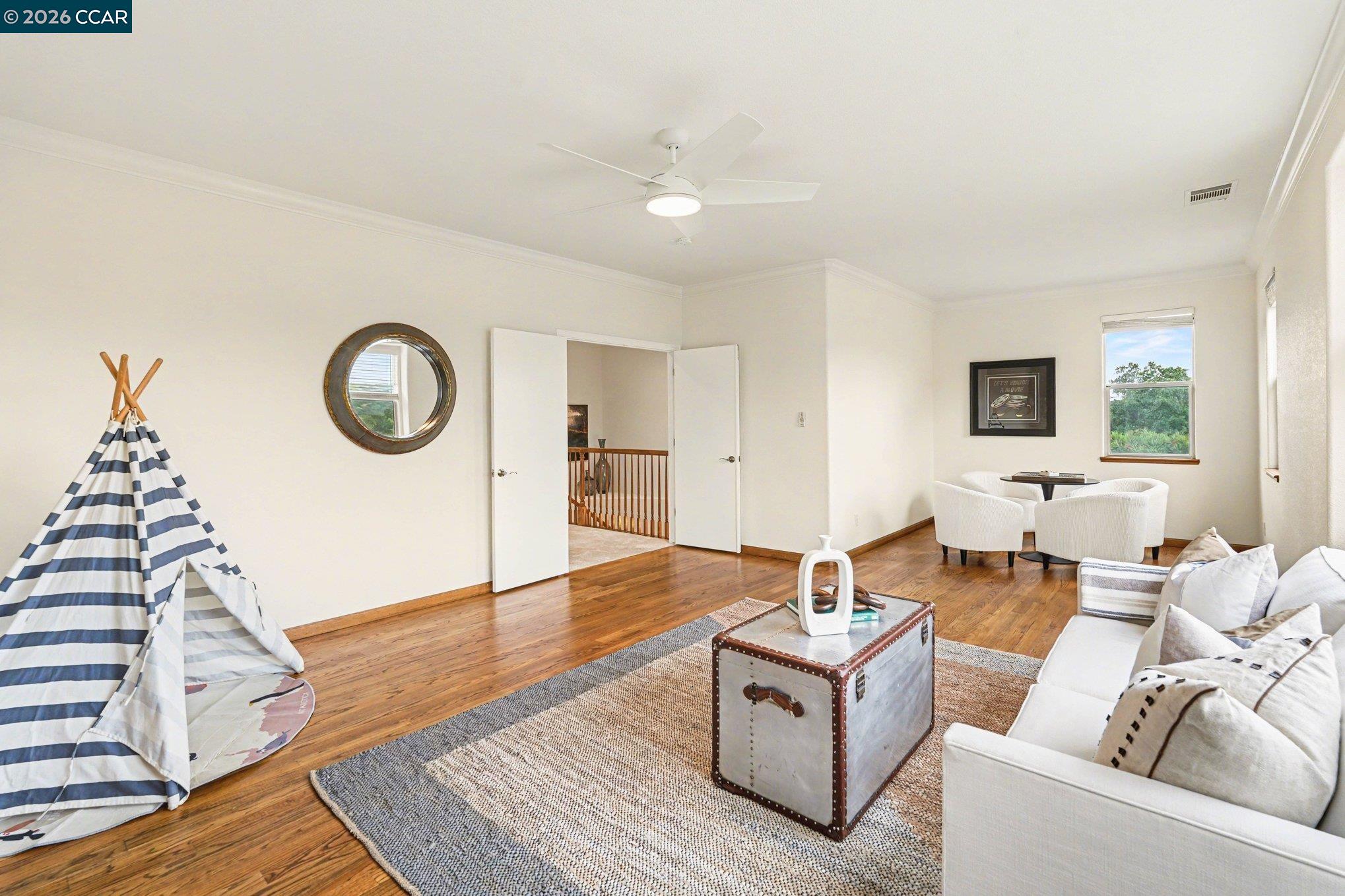 4885 Milden Road Martinez, CA 94553 - Photo 35 of 52 a living room with furniture and a wooden floor