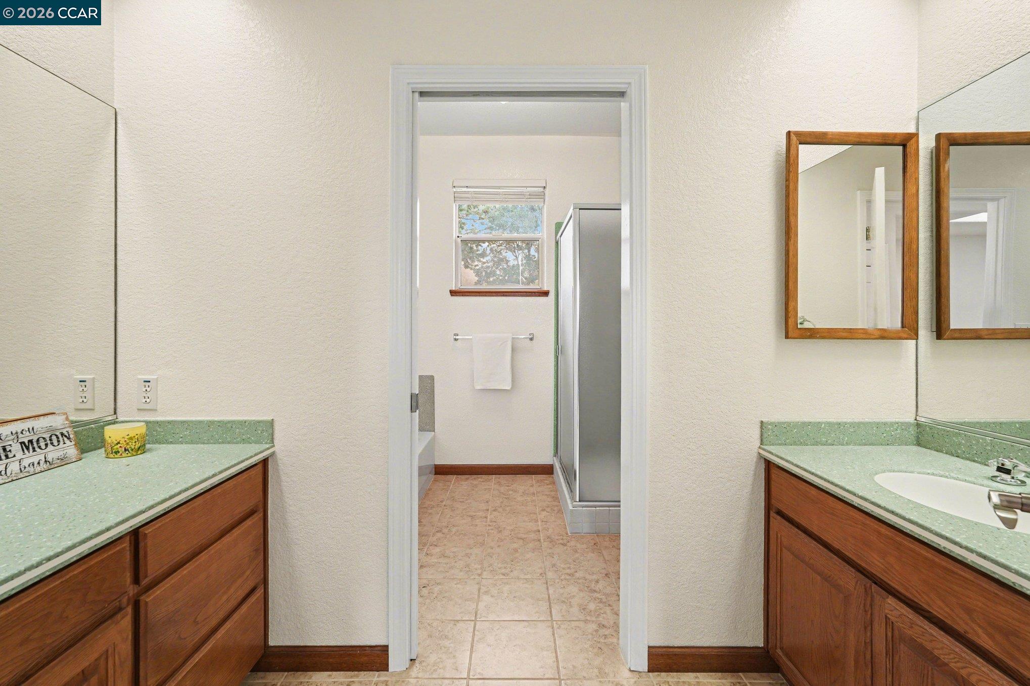 4885 Milden Road Martinez, CA 94553 - Photo 38 of 52 a bathroom with a sink and a mirror