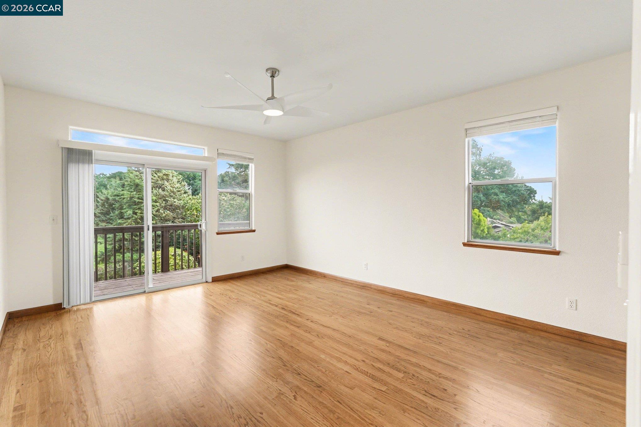 4885 Milden Road Martinez, CA 94553 - Photo 40 of 52 a view of an empty room with wooden floor and a window