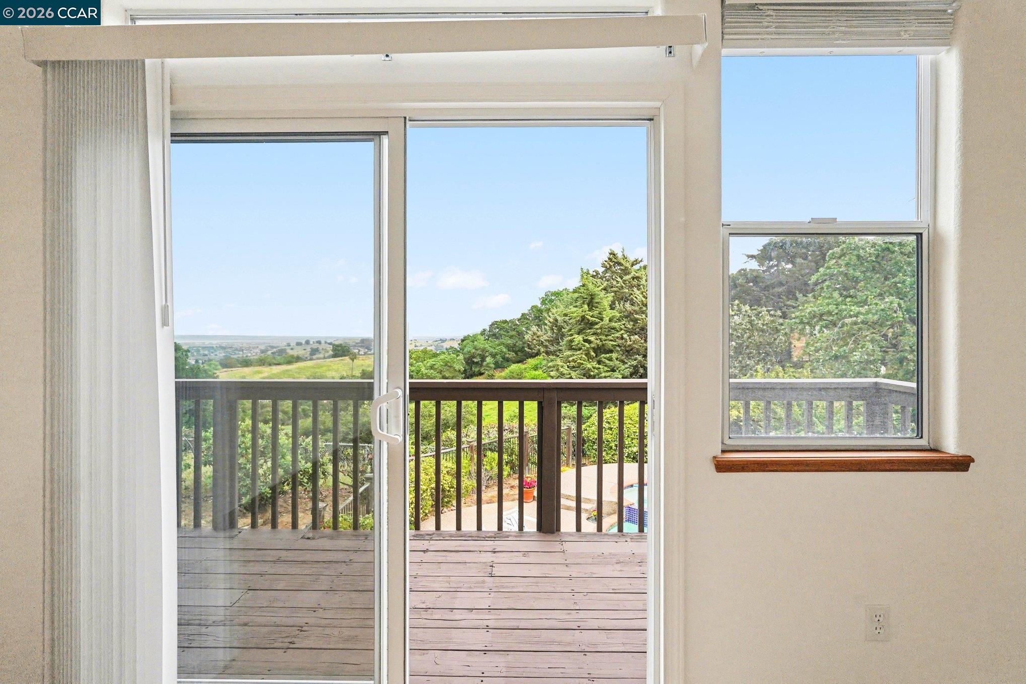 4885 Milden Road Martinez, CA 94553 - Photo 41 of 52 a view of a porch with a floor to ceiling window