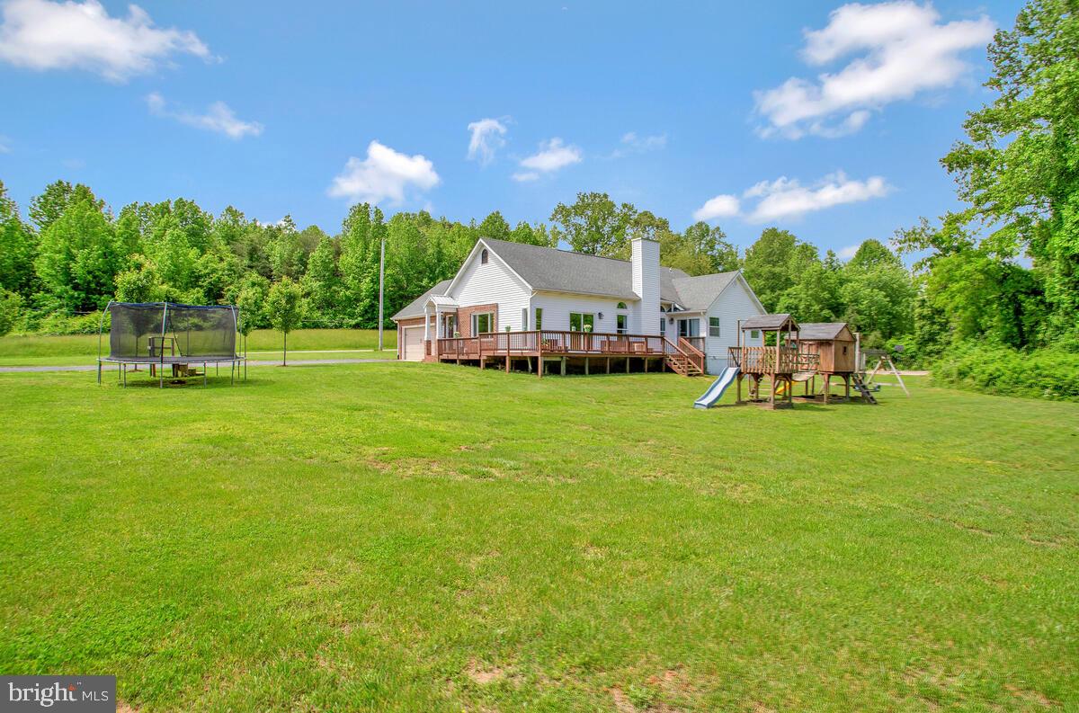 175-m F M F Bowen Road Huntingtown, MD 20639 - Photo 47 of 47 a view of a house with a big yard and large trees