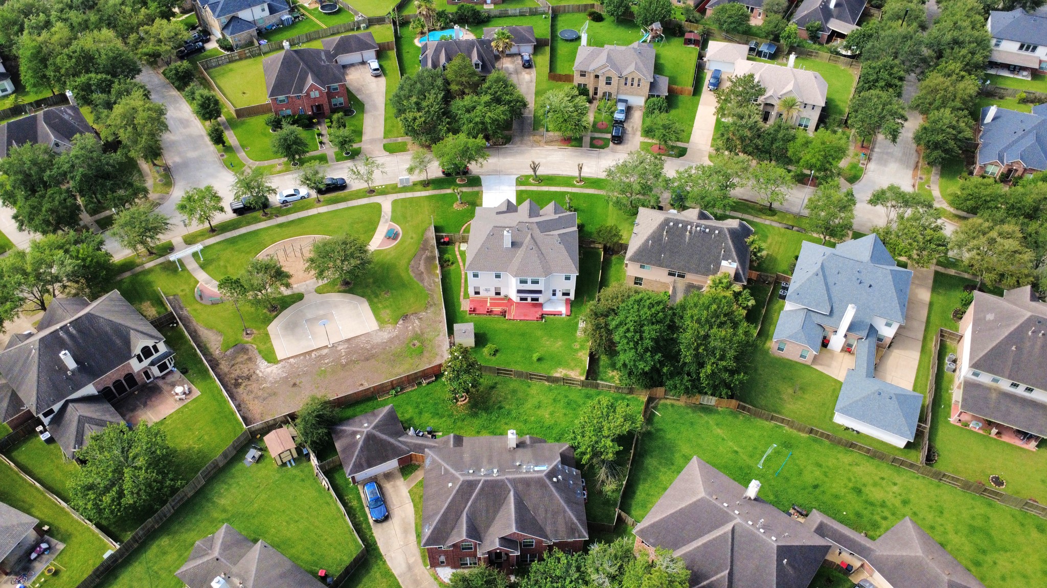 14103 Imperial Wood Lane Rosharon, TX 77583 - Photo 35 of 36 Aerial view showcasing the home's expansive backyard, oversized deck, and beautifully maintained lot
