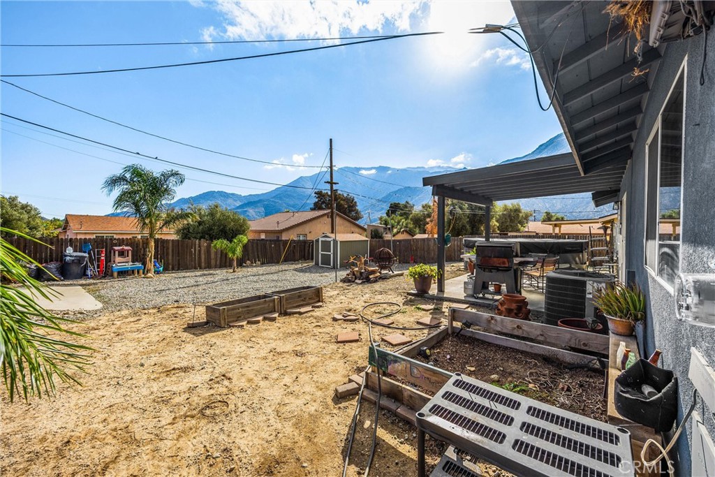 14508 Cabazon Street Cabazon, CA 92230 - Photo 18 of 22 a view of a backyard with sitting area