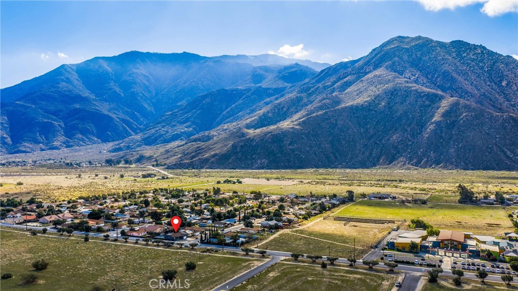 14508 Cabazon Street Cabazon, CA 92230 - Photo 22 of 22 a view of a swimming pool with an outdoor space and seating area