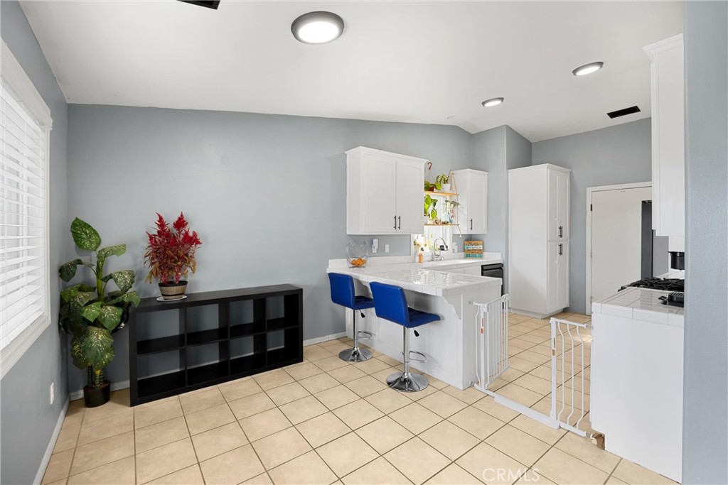 14508 Cabazon Street Cabazon, CA 92230 - Photo 6 of 22 a living room with furniture and a potted plant