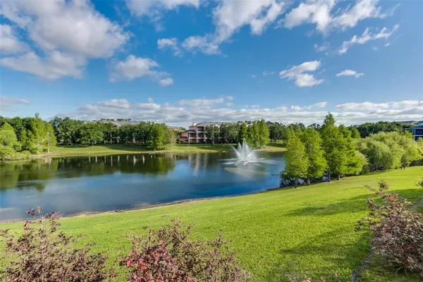 a view of a lake with a city