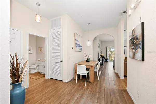 a view of a livingroom with furniture and wooden floor
