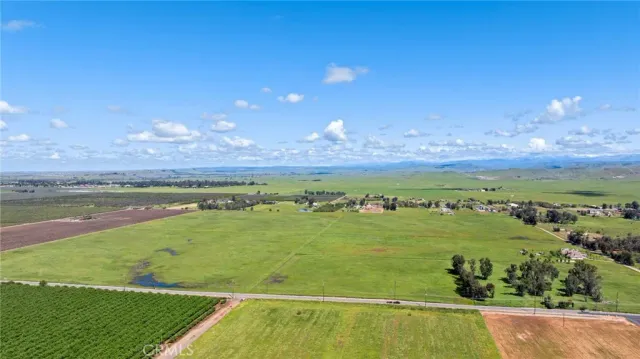 a view of a lake and a yard