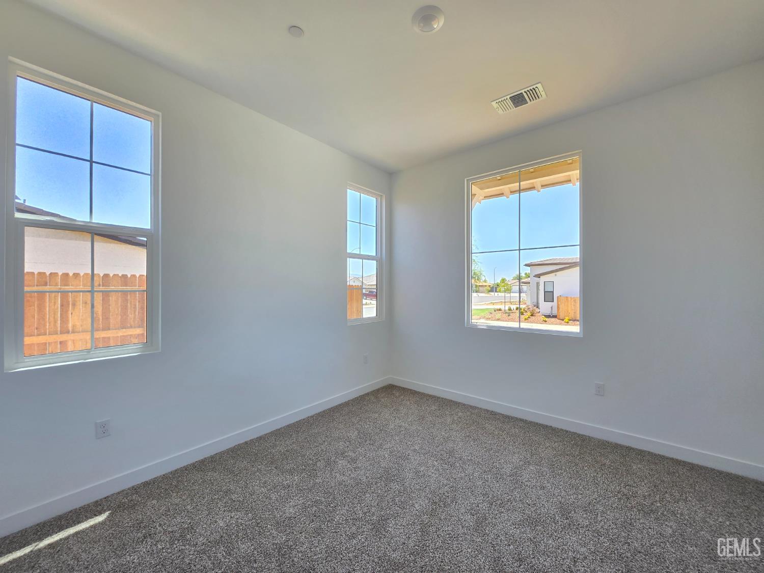 Undisclosed Address Bakersfield, CA 93306 - Photo 19 of 21 an empty room with windows
