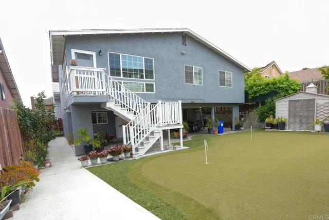 a front view of a house with patio