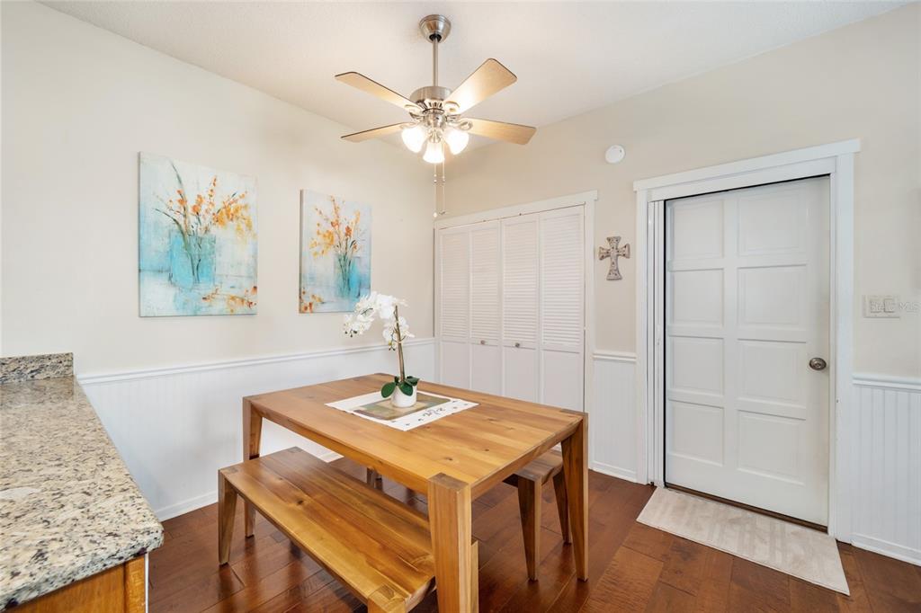 1731 Southeast Clatter Bridge Road Ocala, FL 34471 - Photo 16 of 52 a view of a dining room with a table and chairs