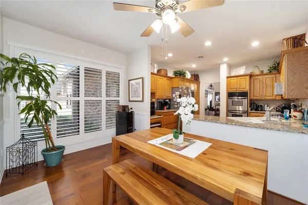 a view of a dining room with furniture