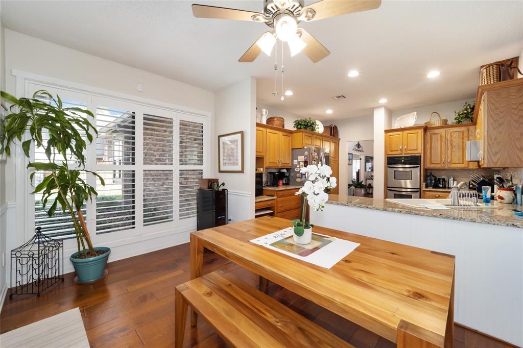 1731 Southeast Clatter Bridge Road Ocala, FL 34471 - Photo 17 of 52 a view of a dining room with furniture