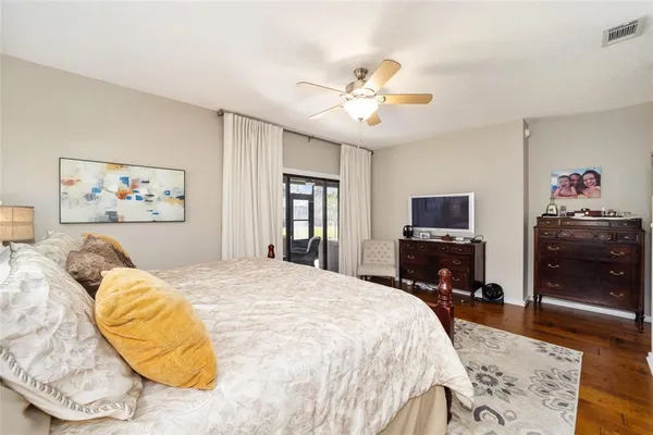 a view of walk in closet with clothes