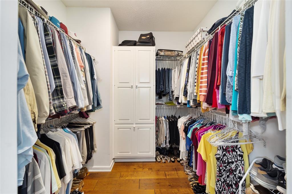 1731 Southeast Clatter Bridge Road Ocala, FL 34471 - Photo 24 of 52 a view of walk in closet with clothes