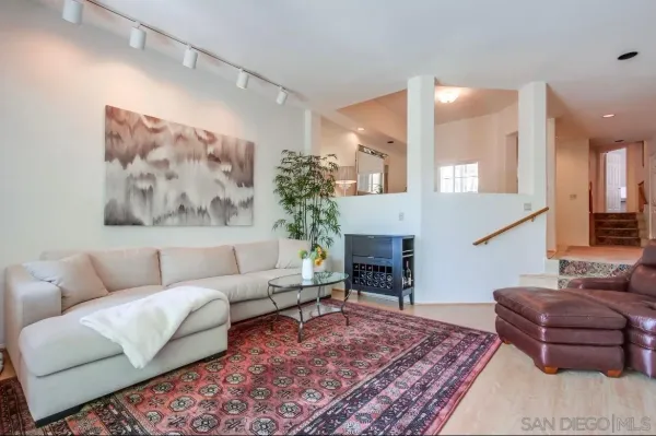 a bedroom with a bed and a fireplace