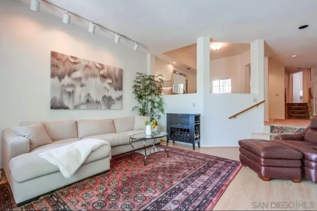 a bedroom with a bed and a fireplace