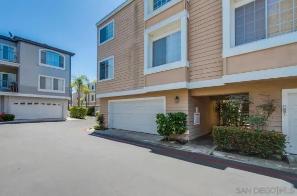 a view of a hallway with washer and dryer