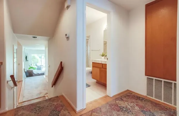 a kitchen with stainless steel appliances kitchen island granite countertop a refrigerator and microwave