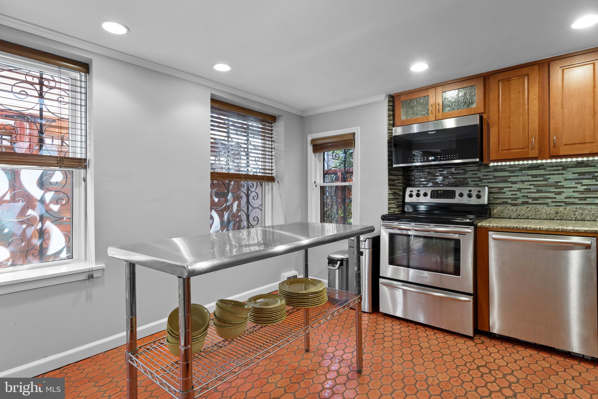 1732 Addison Street Philadelphia, PA 19146 - Photo 10 of 36 Large kitchen with windows overlooking patio