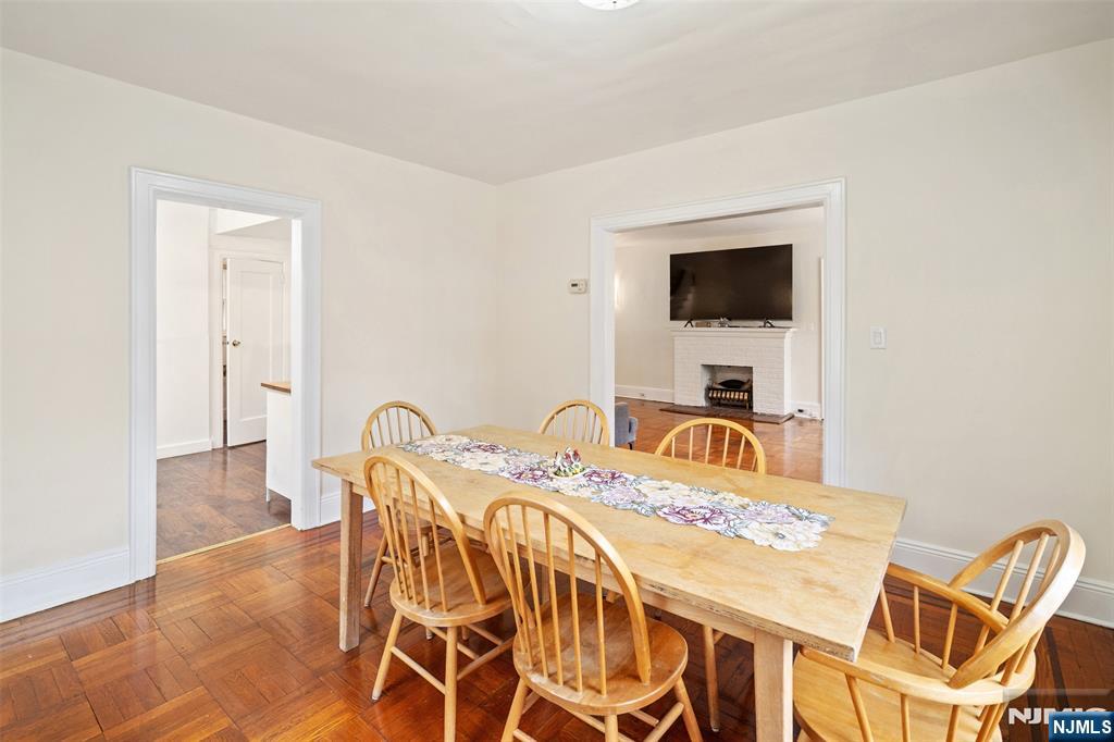 401 Conrad Road Englewood, NJ 07631 - Photo 15 of 42 a bedroom with a bed and a flat screen tv
