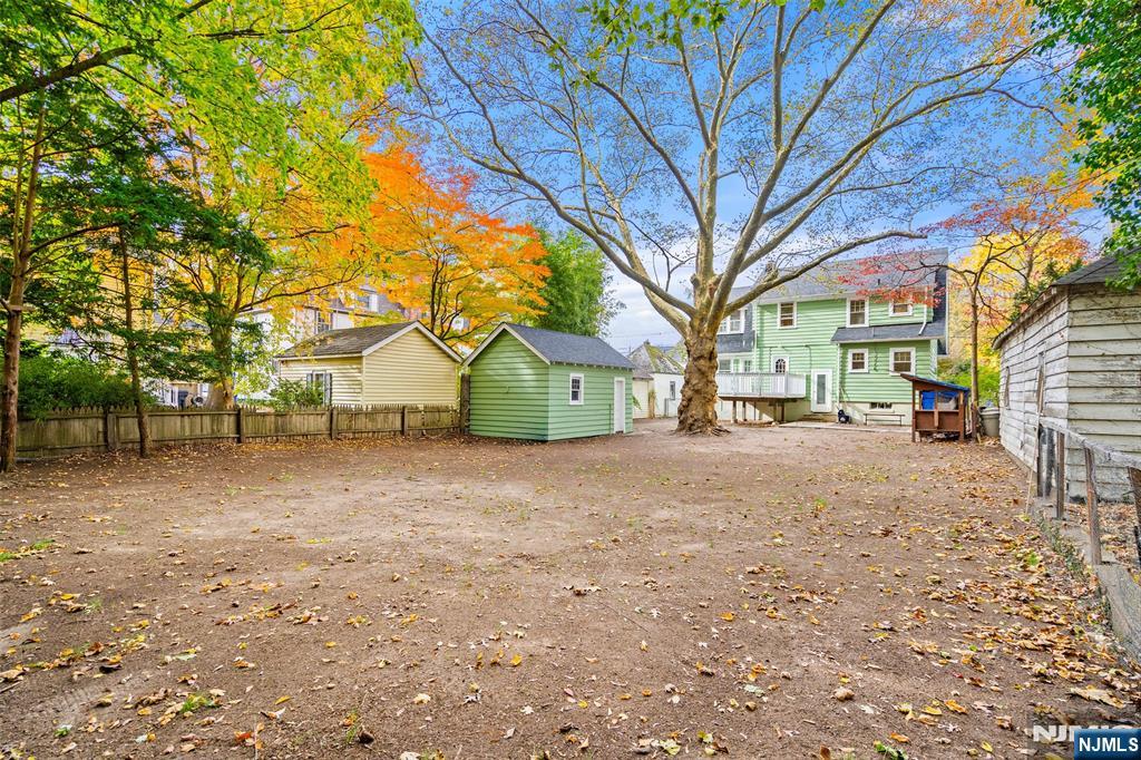 401 Conrad Road Englewood, NJ 07631 - Photo 38 of 42 a view of a yard with a house