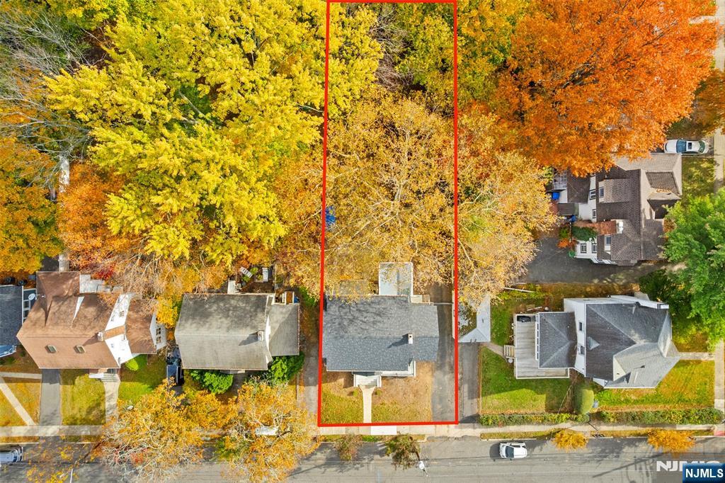 401 Conrad Road Englewood, NJ 07631 - Photo 40 of 42 an aerial view of residential houses with outdoor space