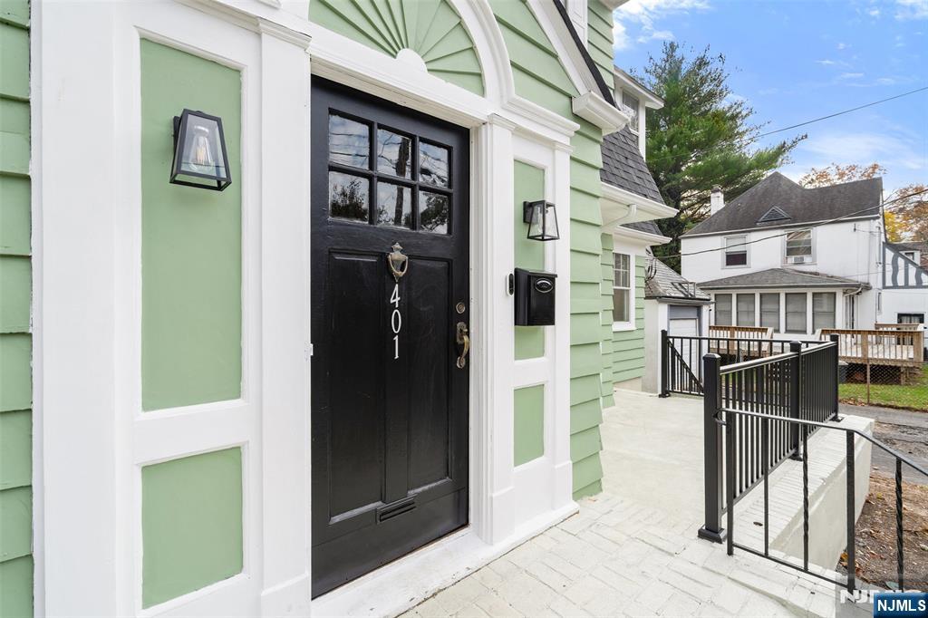 401 Conrad Road Englewood, NJ 07631 - Photo 9 of 42 a view of front door and porch