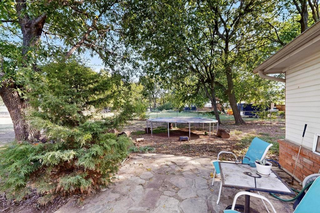 109 Pleasant Run Azle, TX 76020 - Photo 30 of 40 an outdoor space with patio furniture