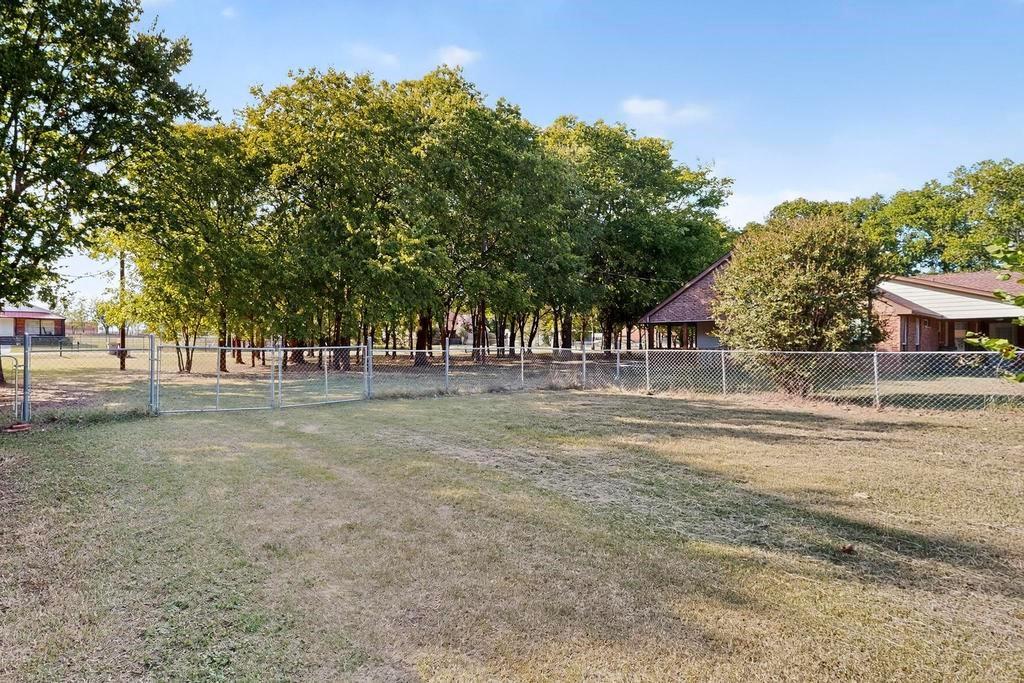 109 Pleasant Run Azle, TX 76020 - Photo 38 of 40 a view of green field with trees