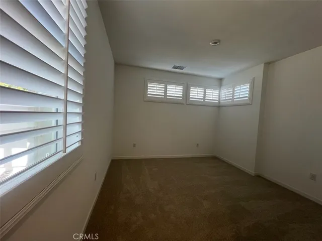a utility room with sink dryer and washer