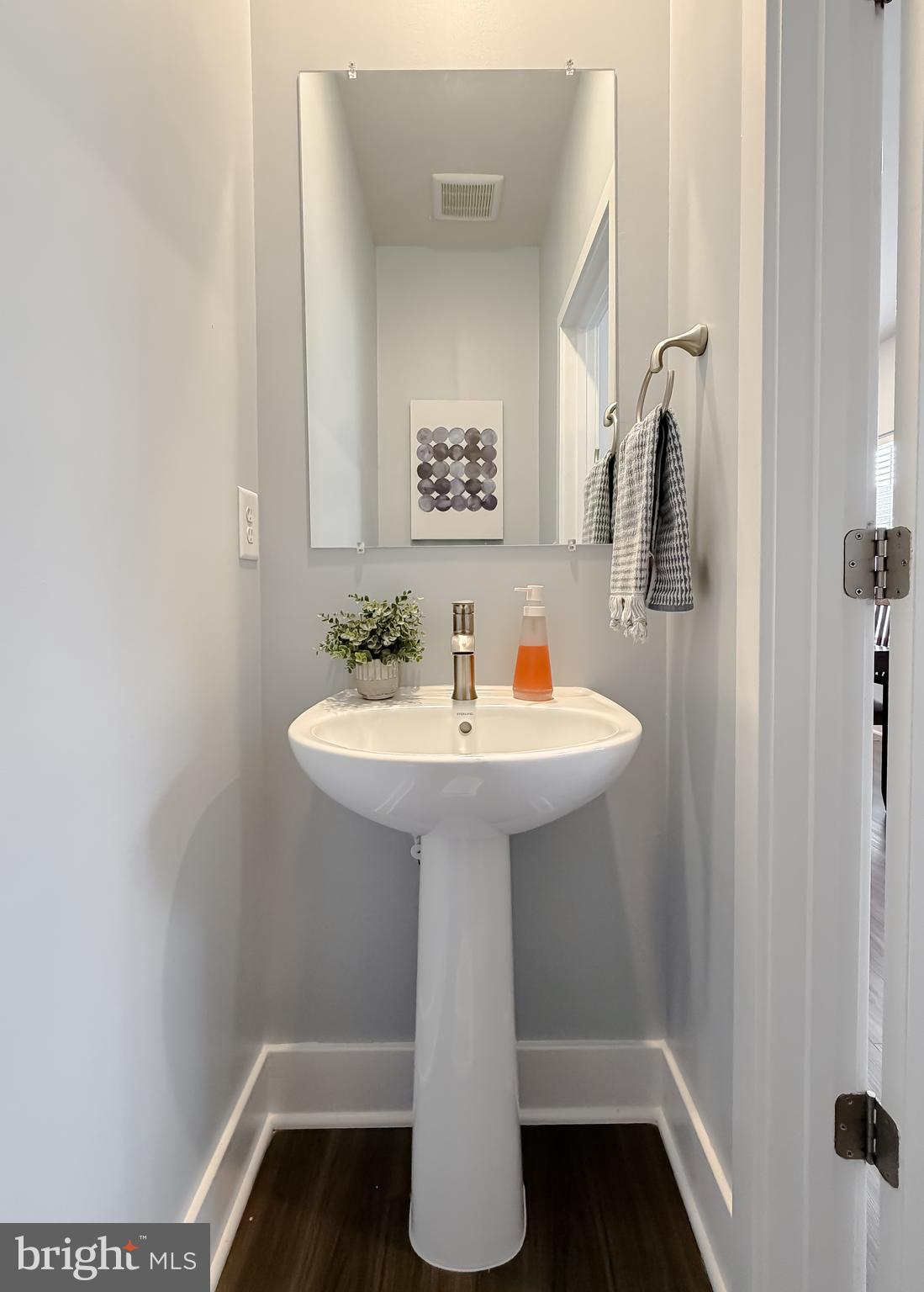 23658 Crosswinds Way California, MD 20619 - Photo 27 of 54 1/2 bathroom on the (2nd level)