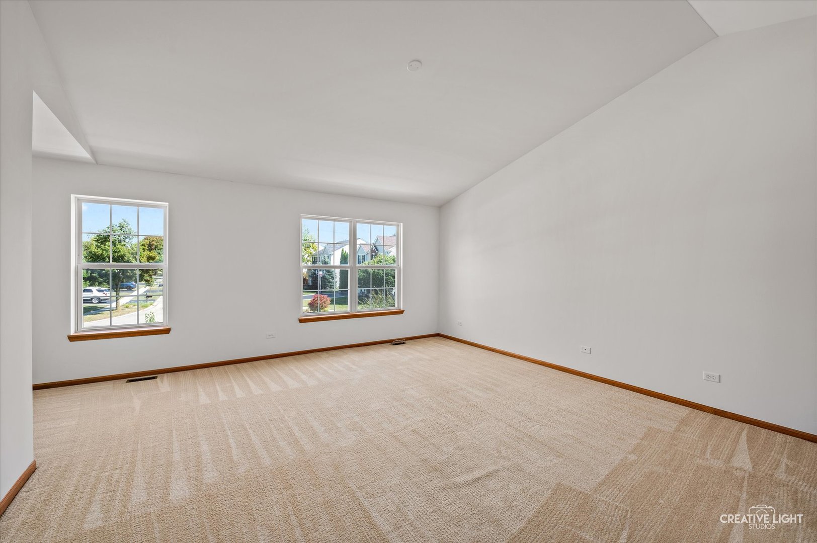 1603 Valley Ridge Drive Plainfield, IL 60586 - Photo 14 of 27 an empty room with windows