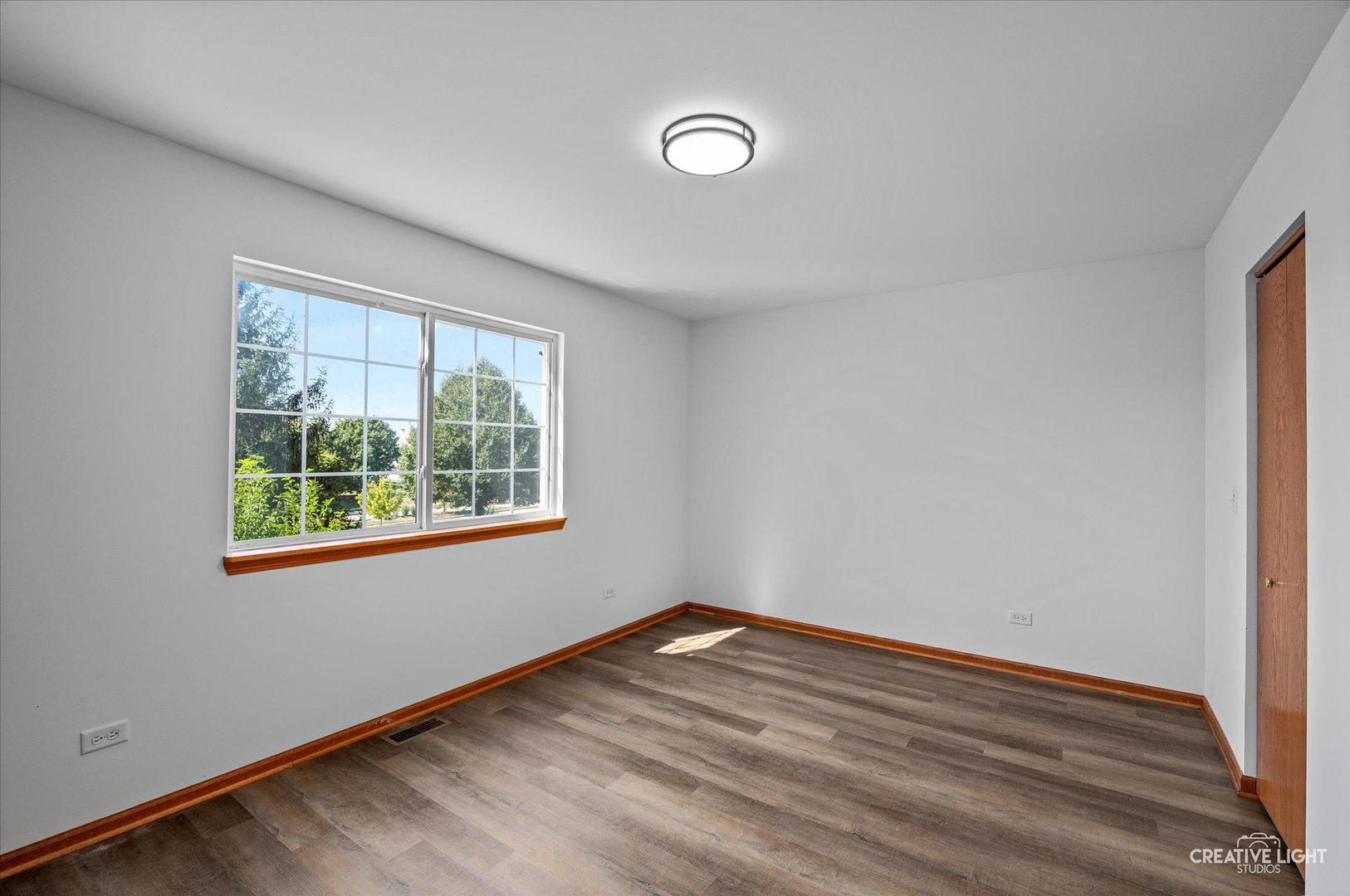 1603 Valley Ridge Drive Plainfield, IL 60586 - Photo 17 of 27 an empty room with a window