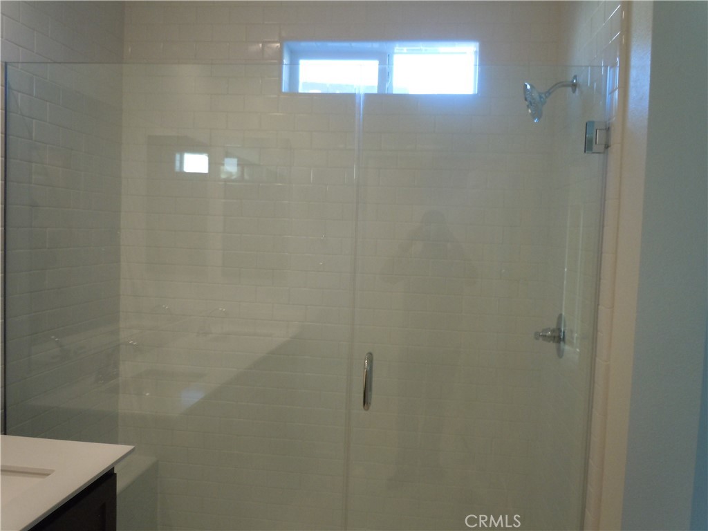 32402 Brunello Way Temecula, CA 92591 - Photo 16 of 22 a bathroom with a shower