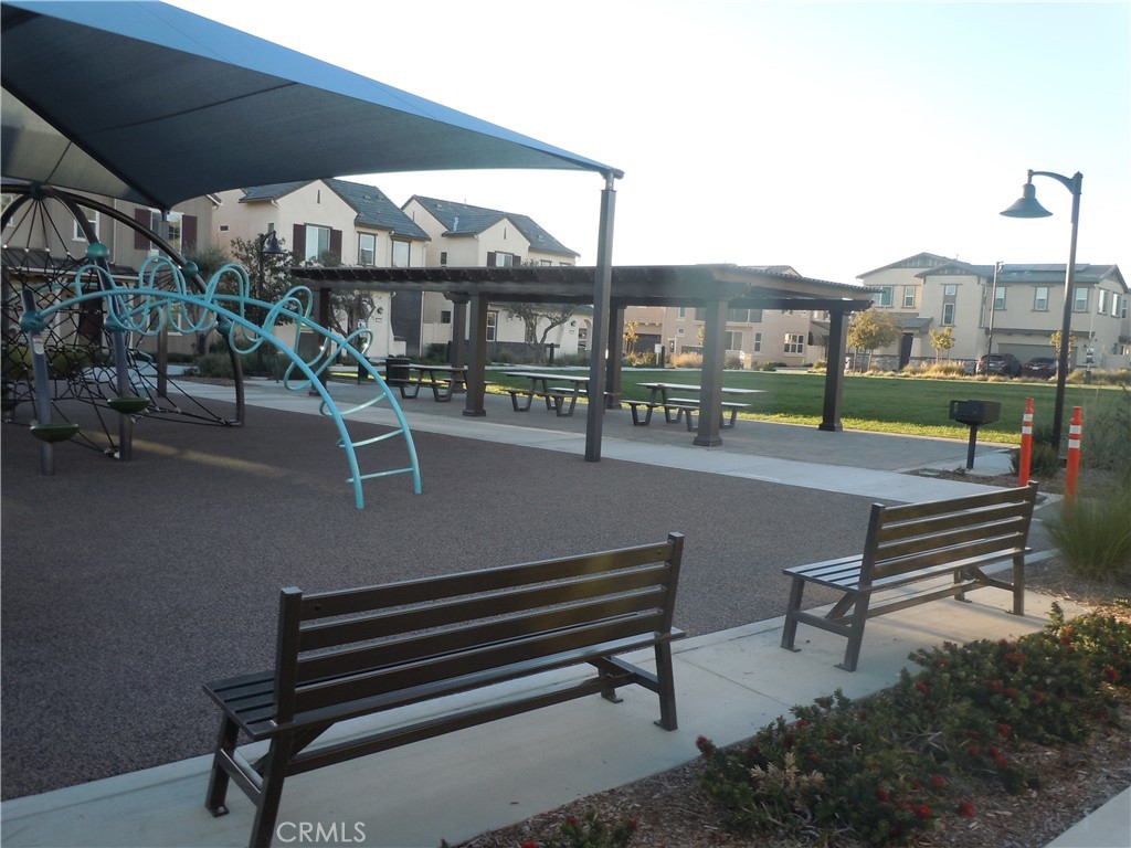 32402 Brunello Way Temecula, CA 92591 - Photo 20 of 22 a building outdoor space with lots of tables and chairs