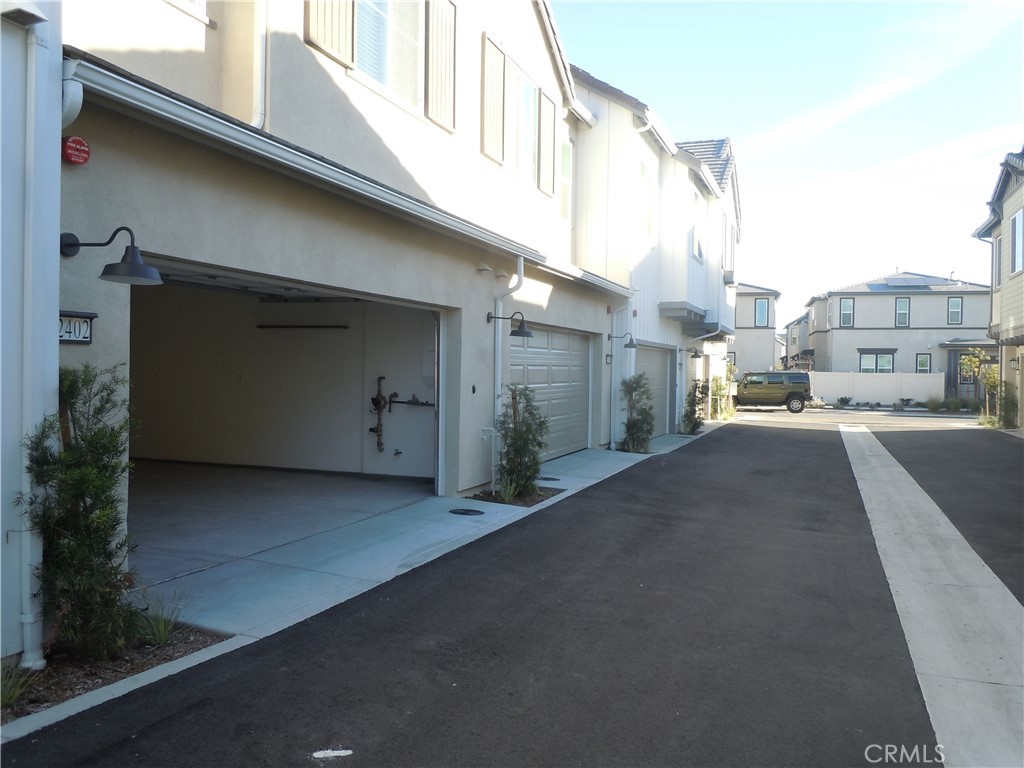 32402 Brunello Way Temecula, CA 92591 - Photo 6 of 22 a view of a street with a building
