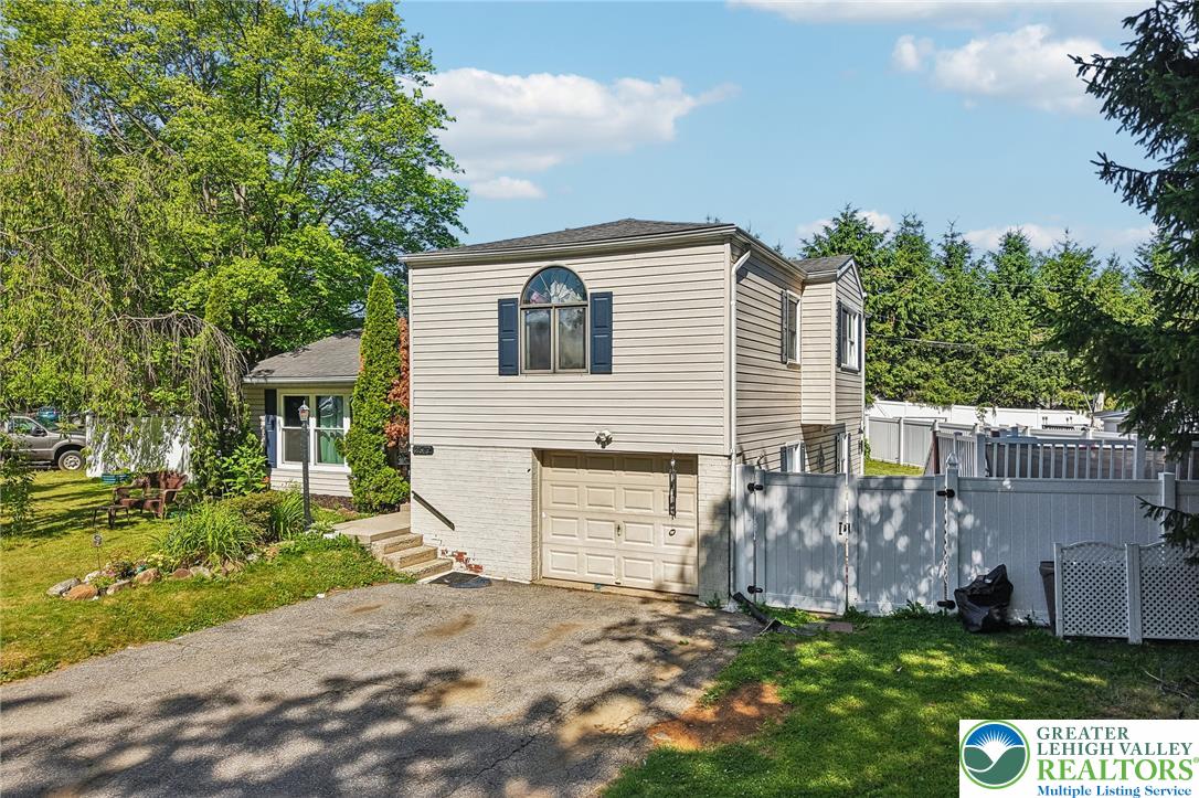 2649 Nottingham Road Bethlehem, PA 18017 - Photo 2 of 49 A well-maintained residence with mature landscaping and a practical driveway.