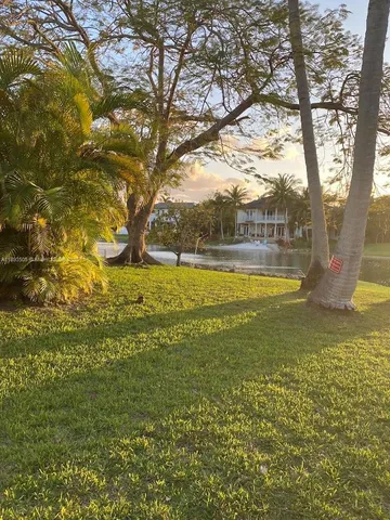 a view of swimming pool with an outdoor space and seating area