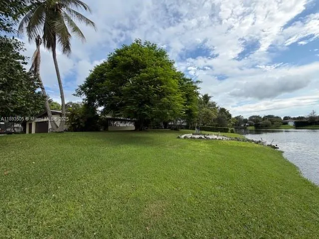 a view of a garden and basketball court