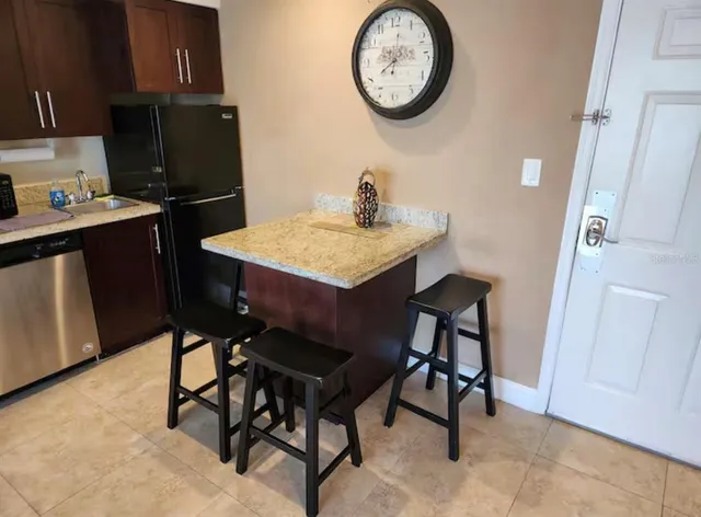 a view of a table and chairs in a kitchen