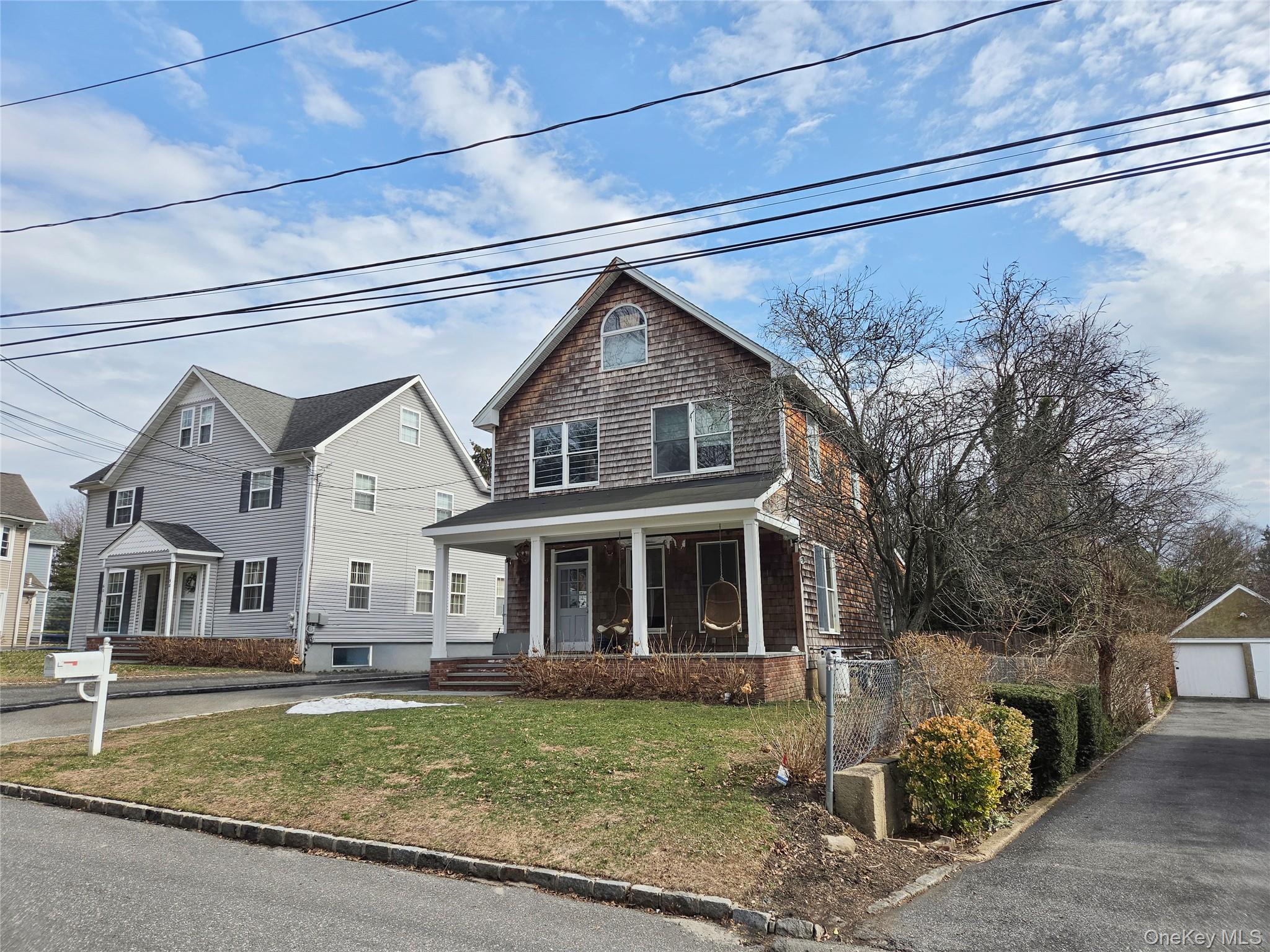 54 Cocks Lane Locust Valley, NY 11560 - Photo 3 of 6 a view of house with a outdoor space
