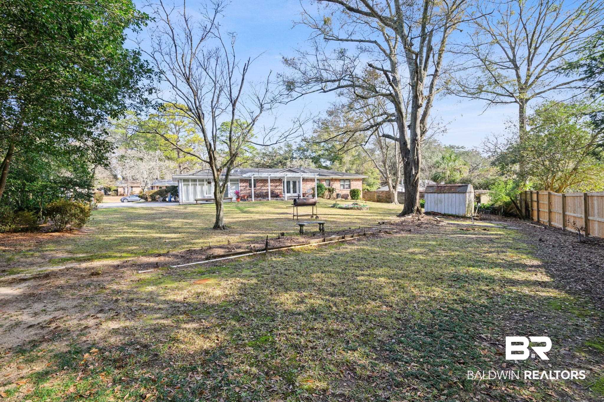 4105 Libby Drive Mobile, AL 36693 - Photo 25 of 26 View of yard with a storage unit