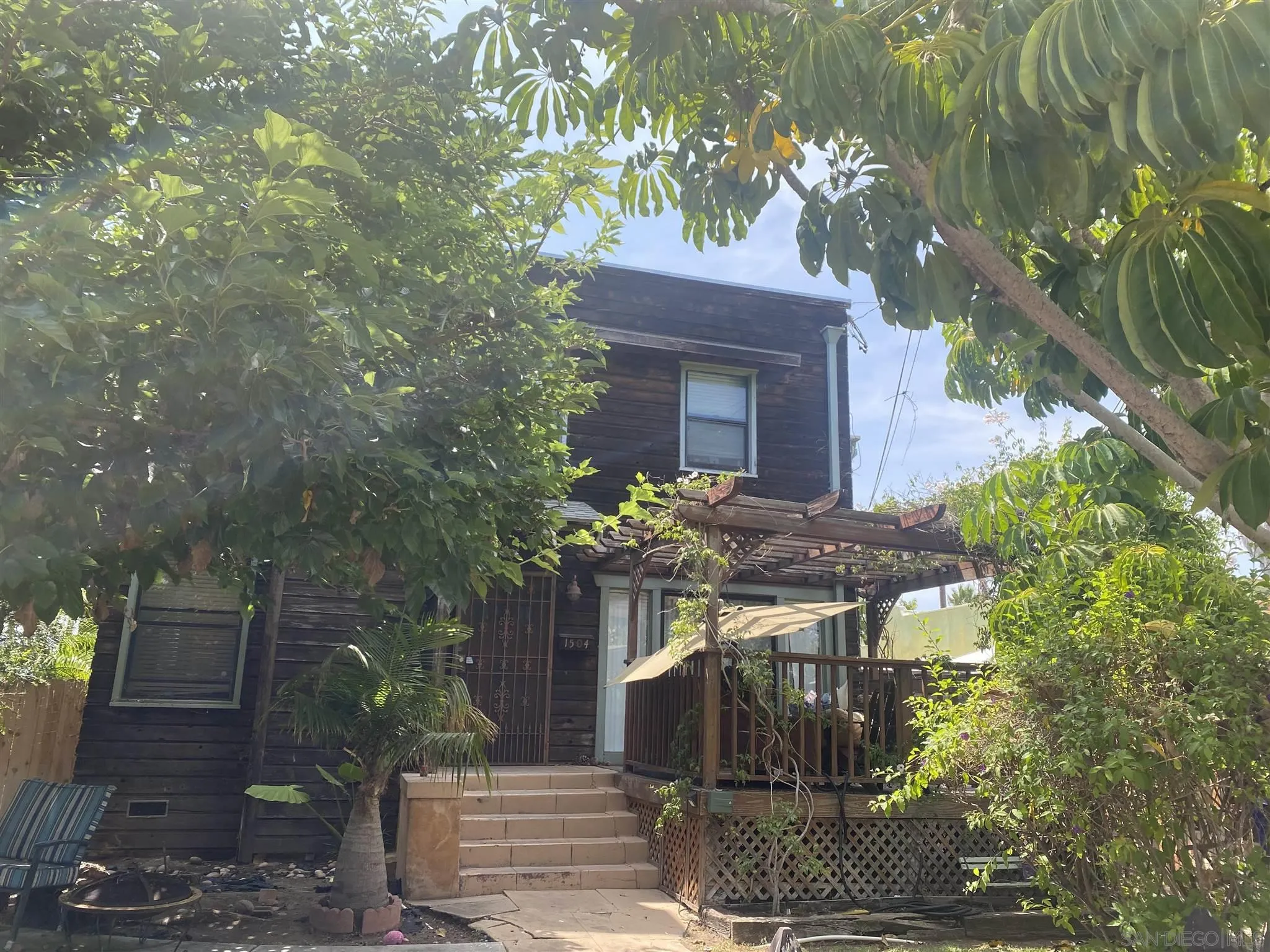 2938 Beech Street San Diego, CA 92102 - Photo 1 of 3 a front view of a house with yard