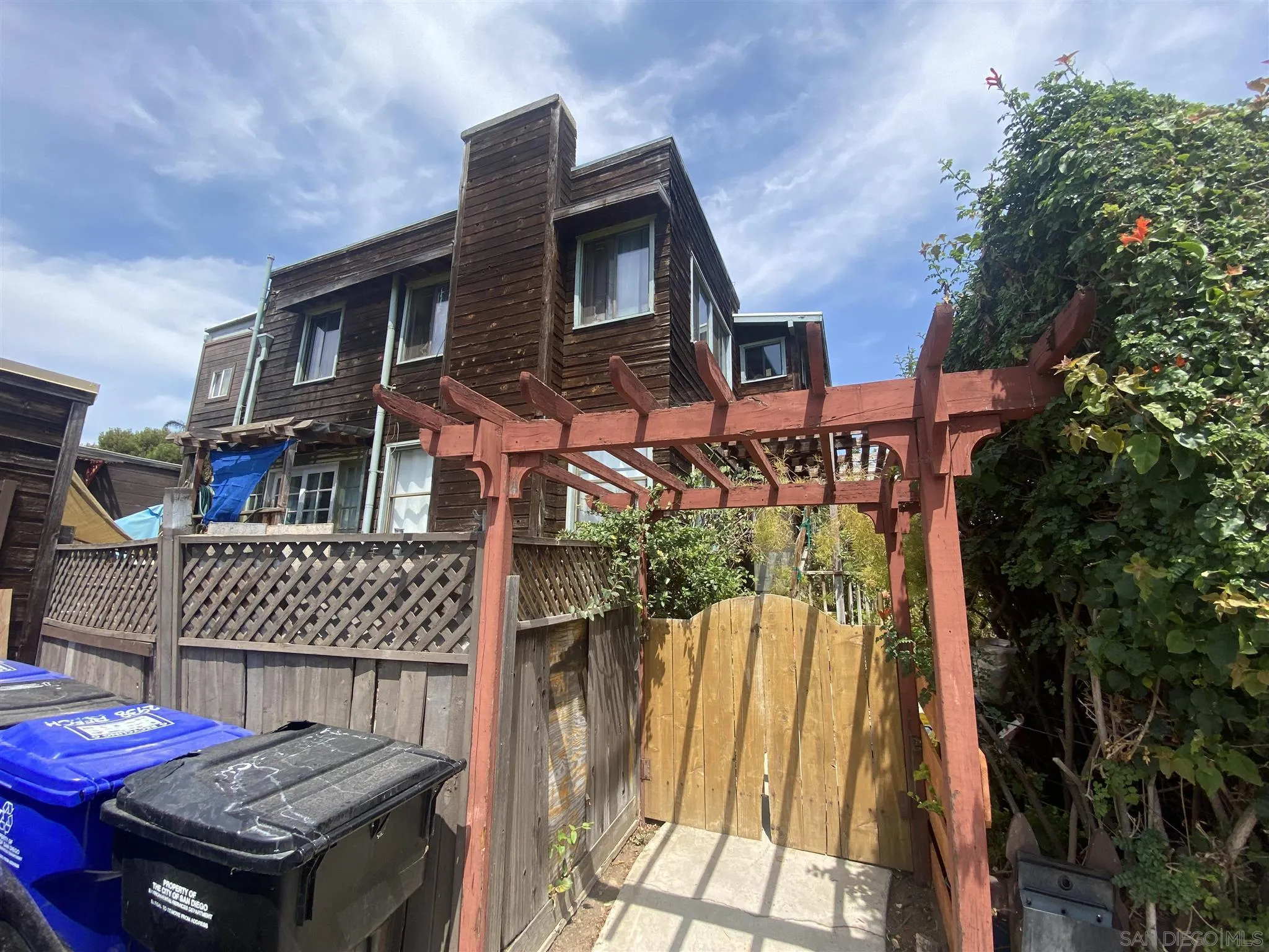 2938 Beech Street San Diego, CA 92102 - Photo 2 of 3 a front view of a house with a yard