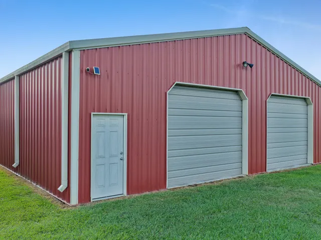 a view of a backyard with cabin