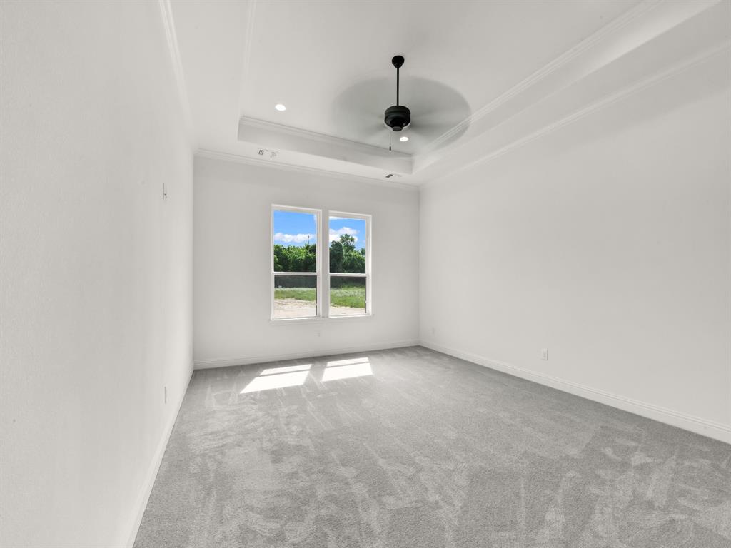 143 Desperado Way Weatherford, TX 76088 - Photo 20 of 36 Unfurnished living room featuring ceiling fan, beam ceiling, high vaulted ceiling, recessed lighting, and a chandelier