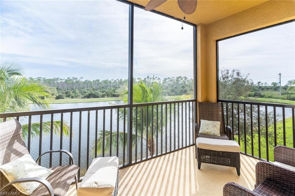 9731 Acqua Court, Unit 536 Naples, FL 34113 - Photo 1 of 48 a balcony with view of city from a balcony