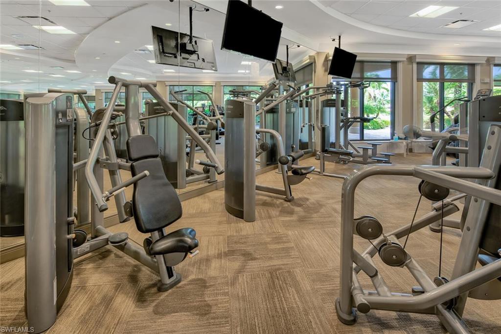 9731 Acqua Court, Unit 536 Naples, FL 34113 - Photo 36 of 48 a view of a room with gym equipment